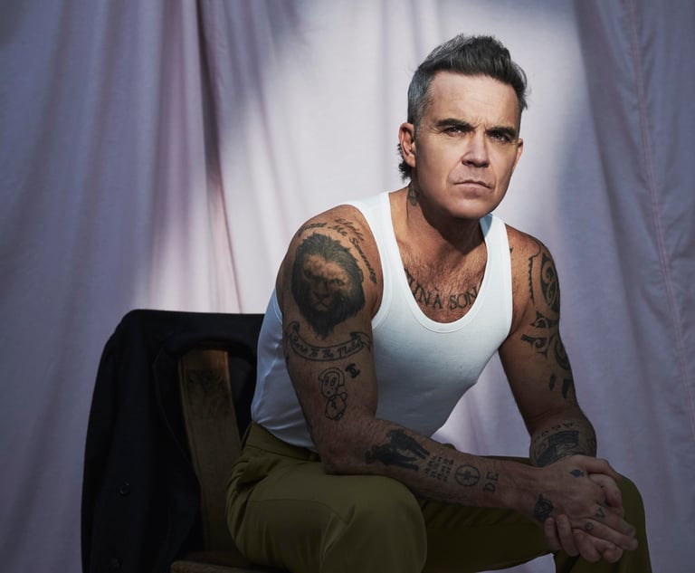 ROBBIE-WILLIAMS-PRESS_S12_149 1 (1)